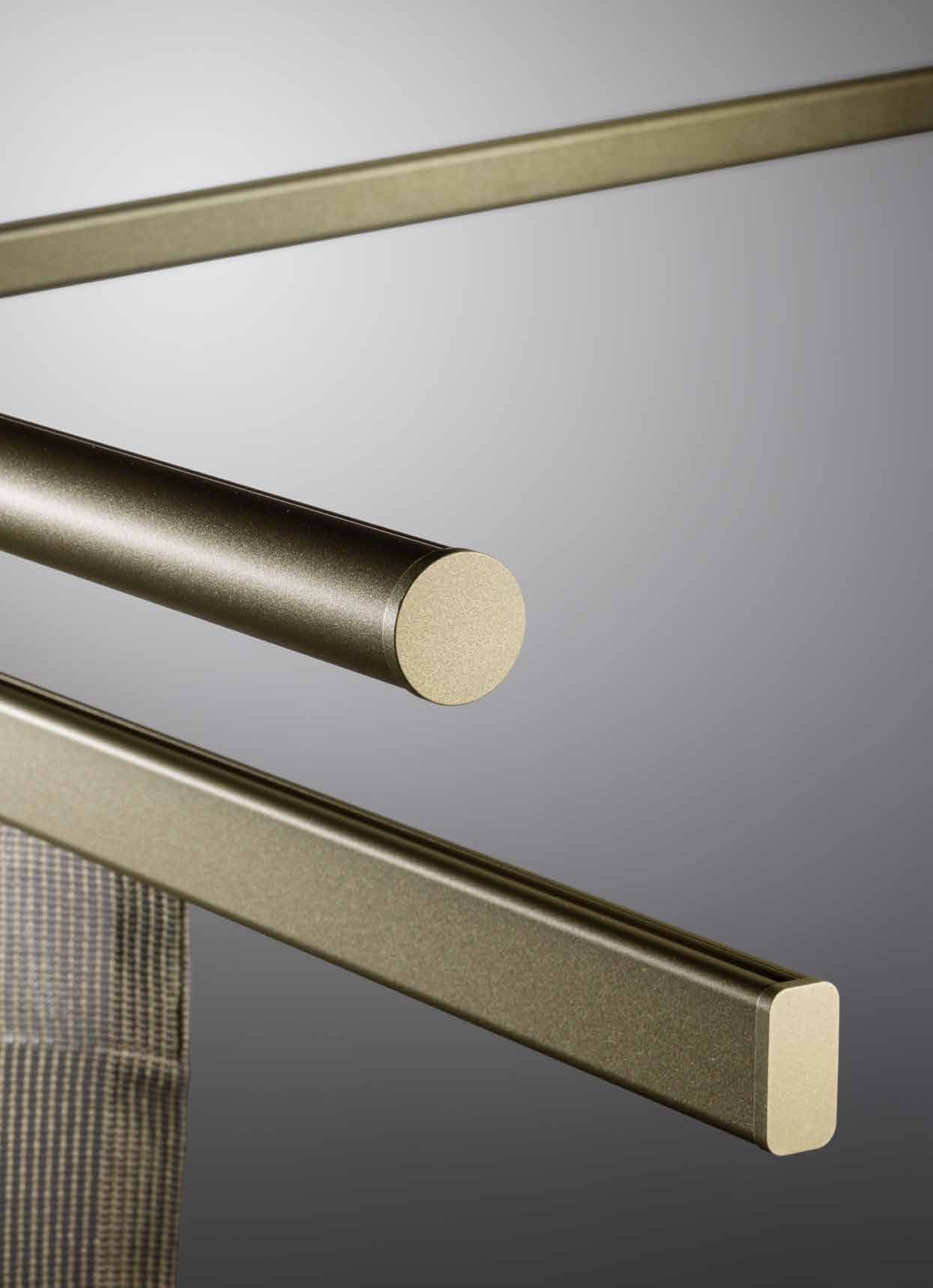 Uiteinden van ronde en ovale SLIDE-profielen met goudkleurige afwerking Uiteinden van ronde en ovale SLIDE-profielen met goudkleurige afwerking.